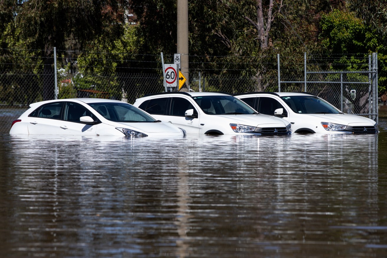 Cars stranded in floodwater in Shepparton on Monday.