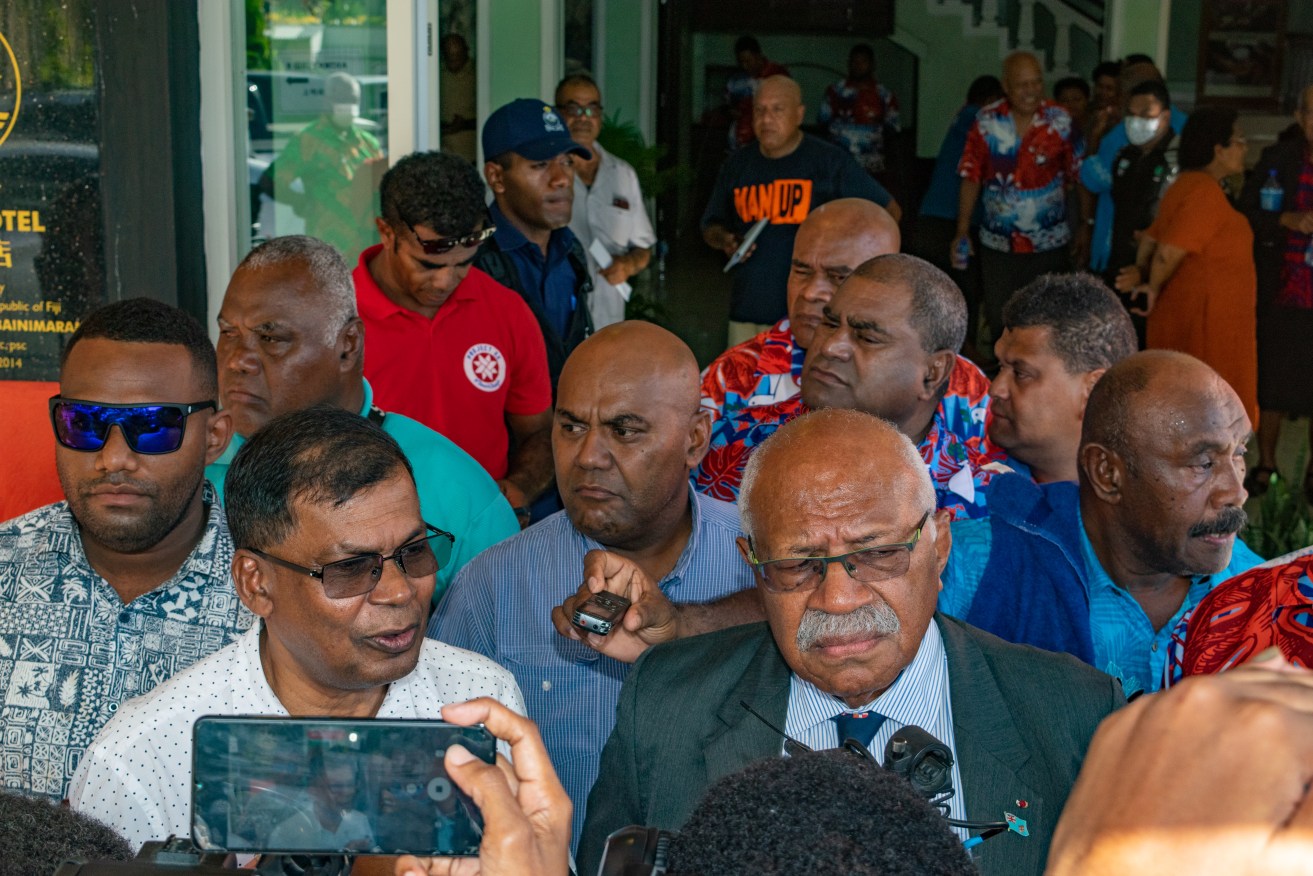 Sitiveni Rabuka (front right) after this week's meeting that sealed a deal for him to return as Fiji's PM.