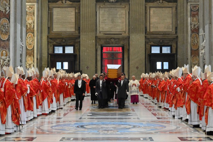 Benedict XVI buried as supporters urge sainthood