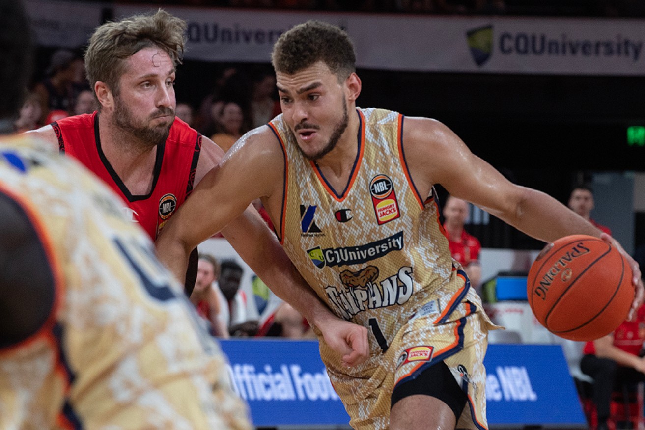 A game-high 32 points from DJ Hogg has helped Cairns overcome Perth in their NBL play-In match.