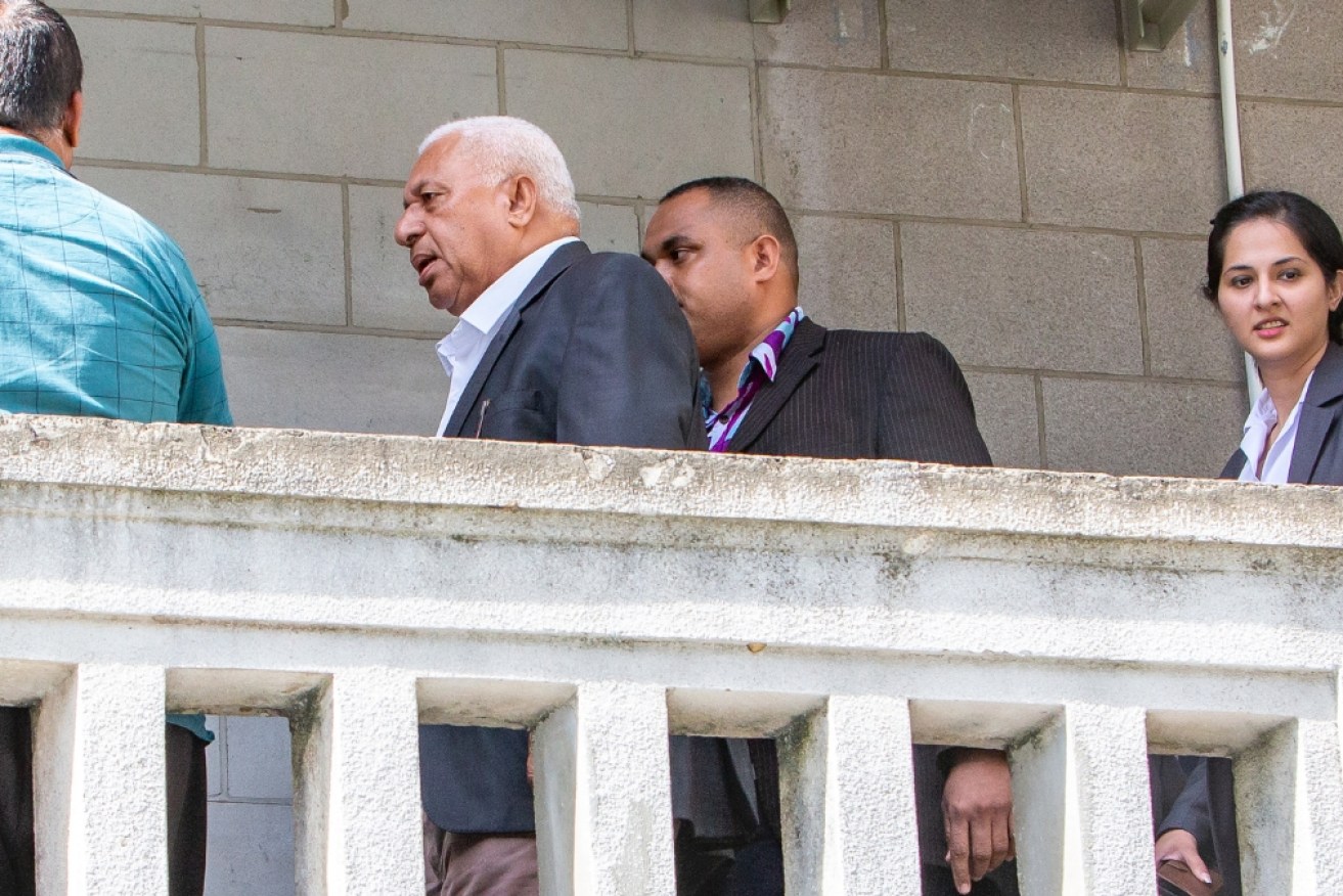 Fiji's former prime minister Frank Bainimarama on his way to the court house on Friday.