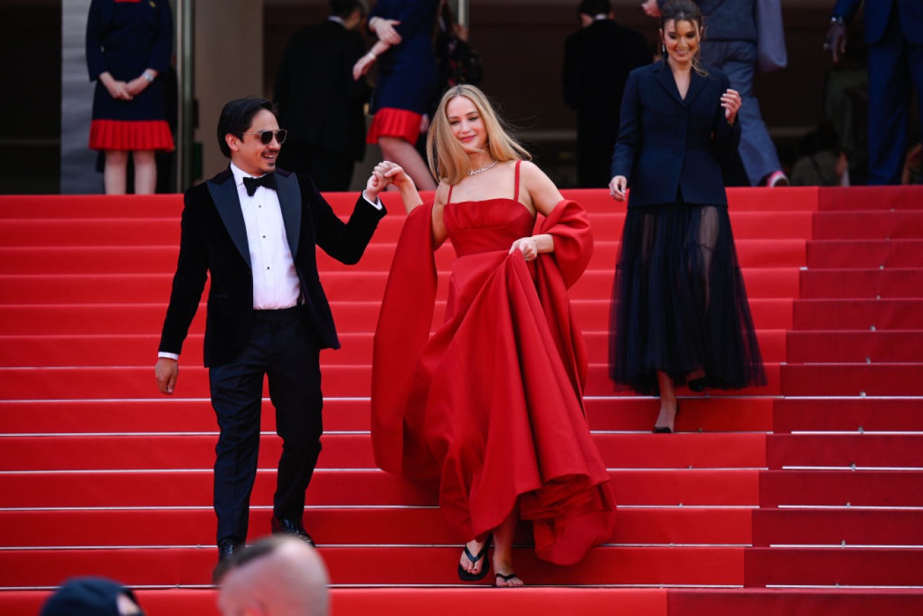 Jennifer Lawrence, who tripped at the 2013 Oscars, was steady in her thongs at the <i>Anatomie D'une Chute </i> red carpet. 