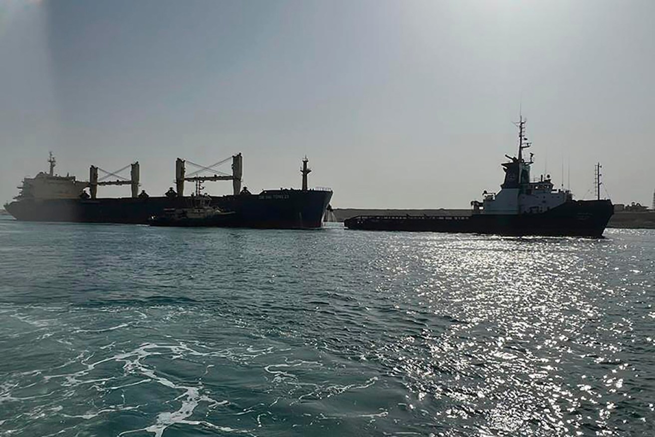 The Suez Canal Authority is towing a ship that broke down in a single-lane section of the waterway. 