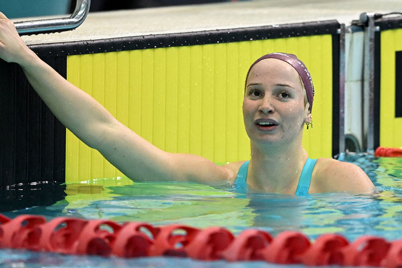 Mollie O'Callaghan catches her breath after winning the women's 200m freestyle final in Melbourne.