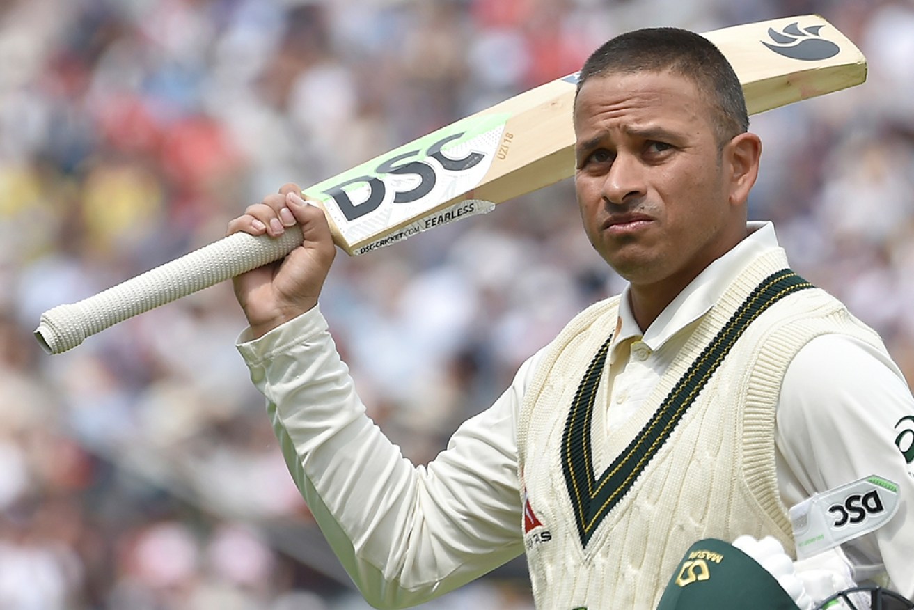 Usman Khawaja acknowledges the crowd after being dismissed for a marathon 141 at Edgbaston.