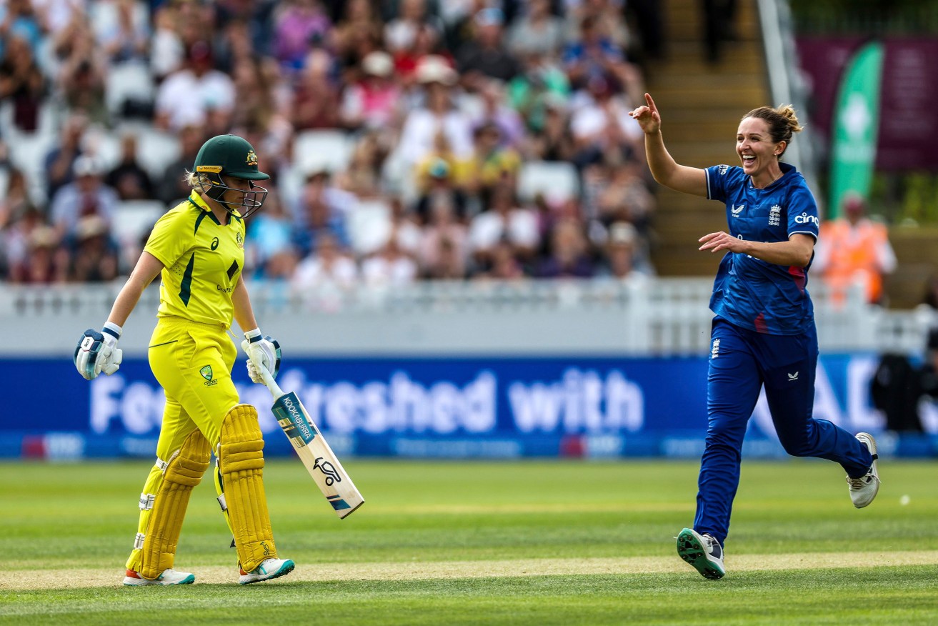 England's Lauren Bell celebrates bowling out Australia's Alyssa Healy.