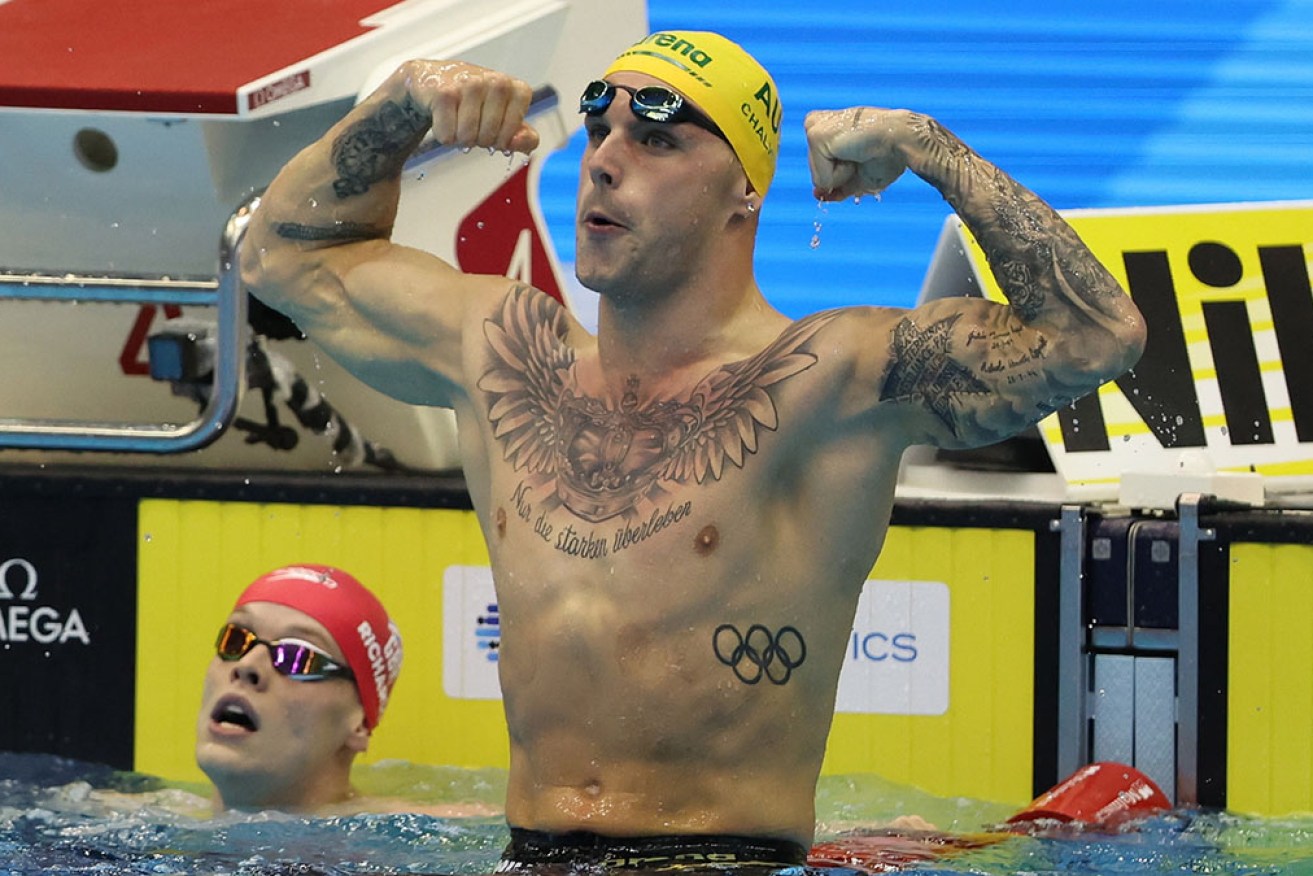 Kyle Chalmers celebrates his gold medal in the 100m freestyle at the world championships. 