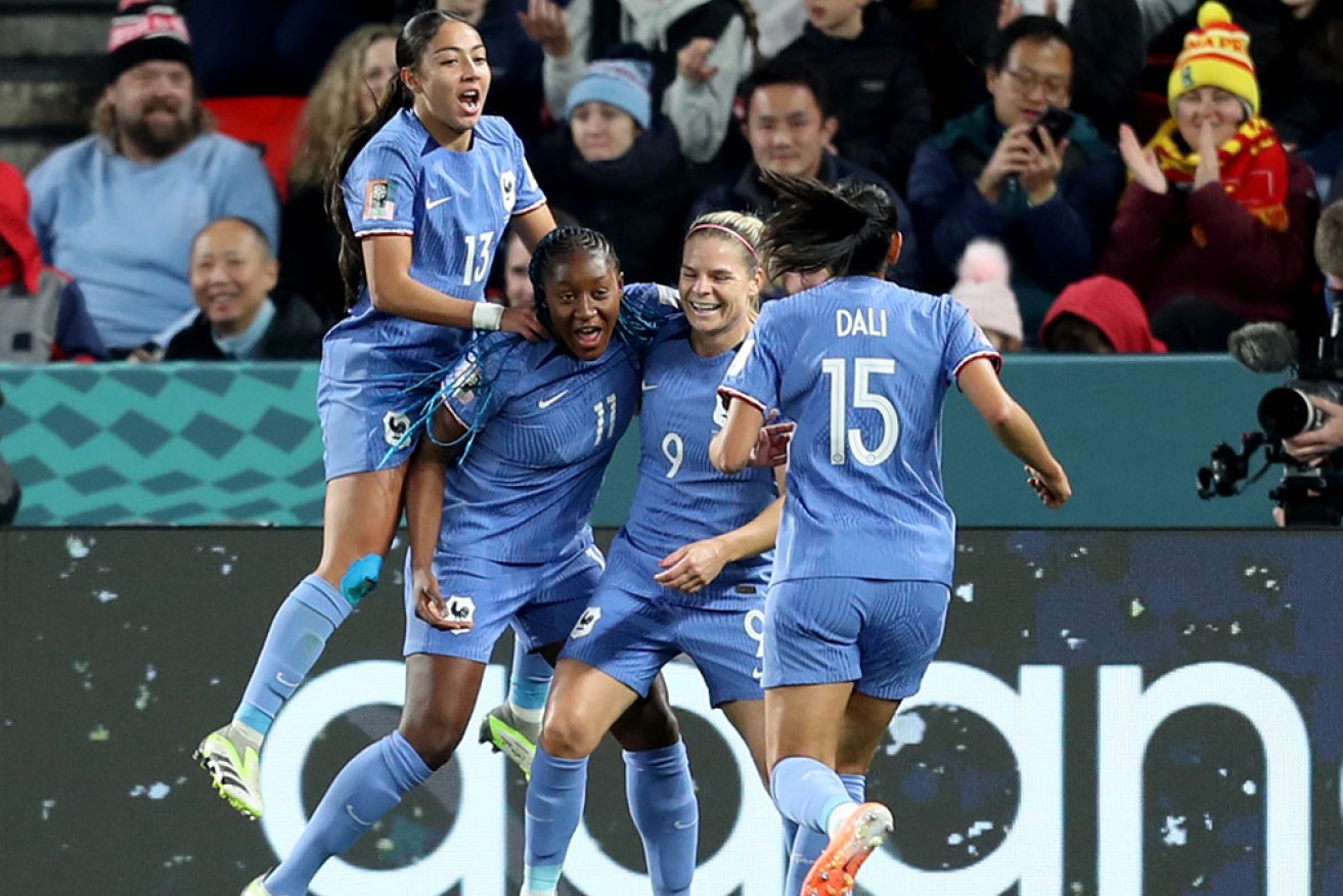 France will meet Australia in the Women's World Cup quarter-final after easily beating Morocco 4-0.