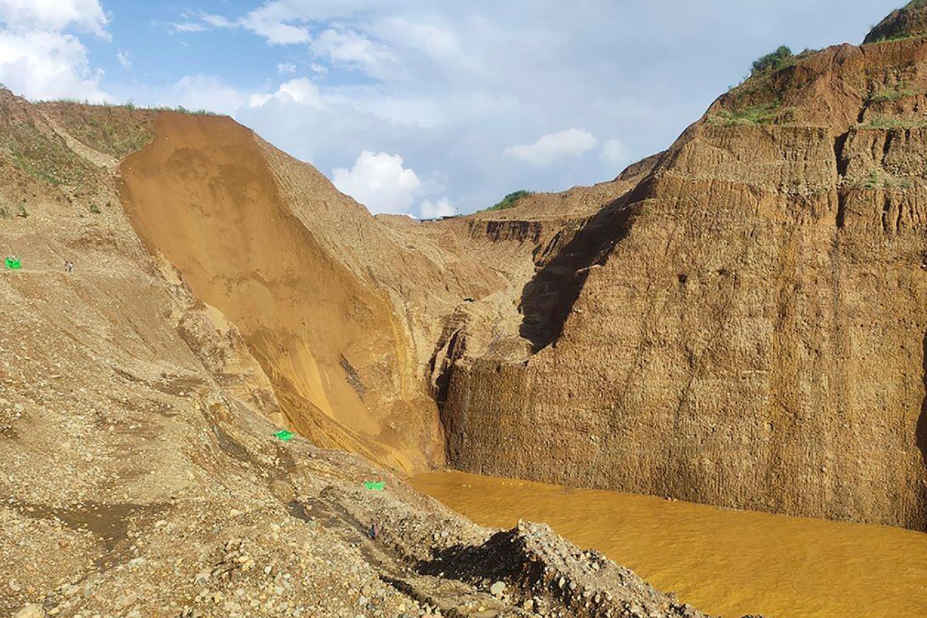 Rescue teams in northern Myanmar have found 22 bodies following a huge landslide near a jade mine.