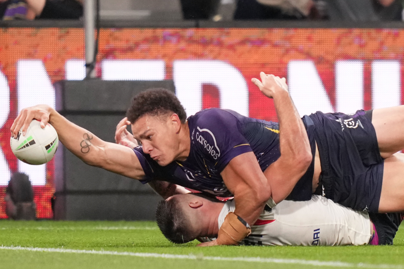 The Storm's Will Warbrick scores the winning try in the NRL semi-final against the Roosters.