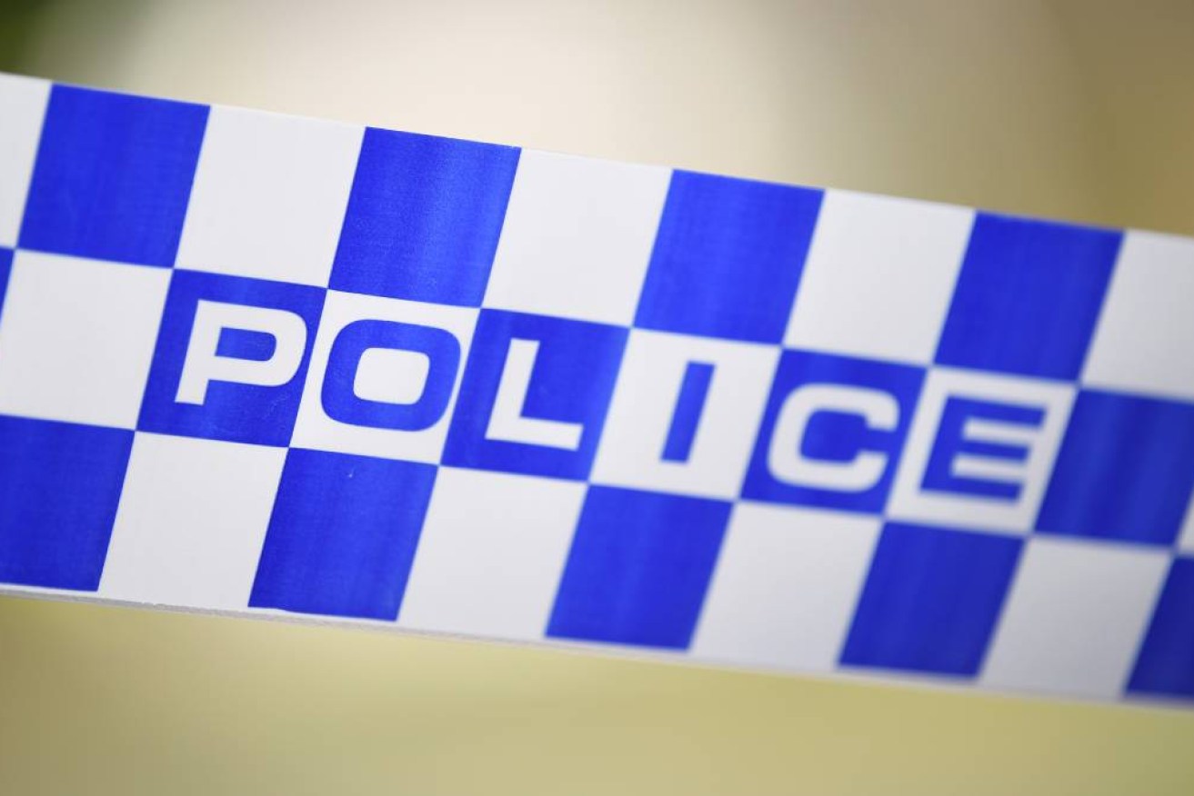 A man is dead and a woman has suffered serious head injuries at a home north of Brisbane.