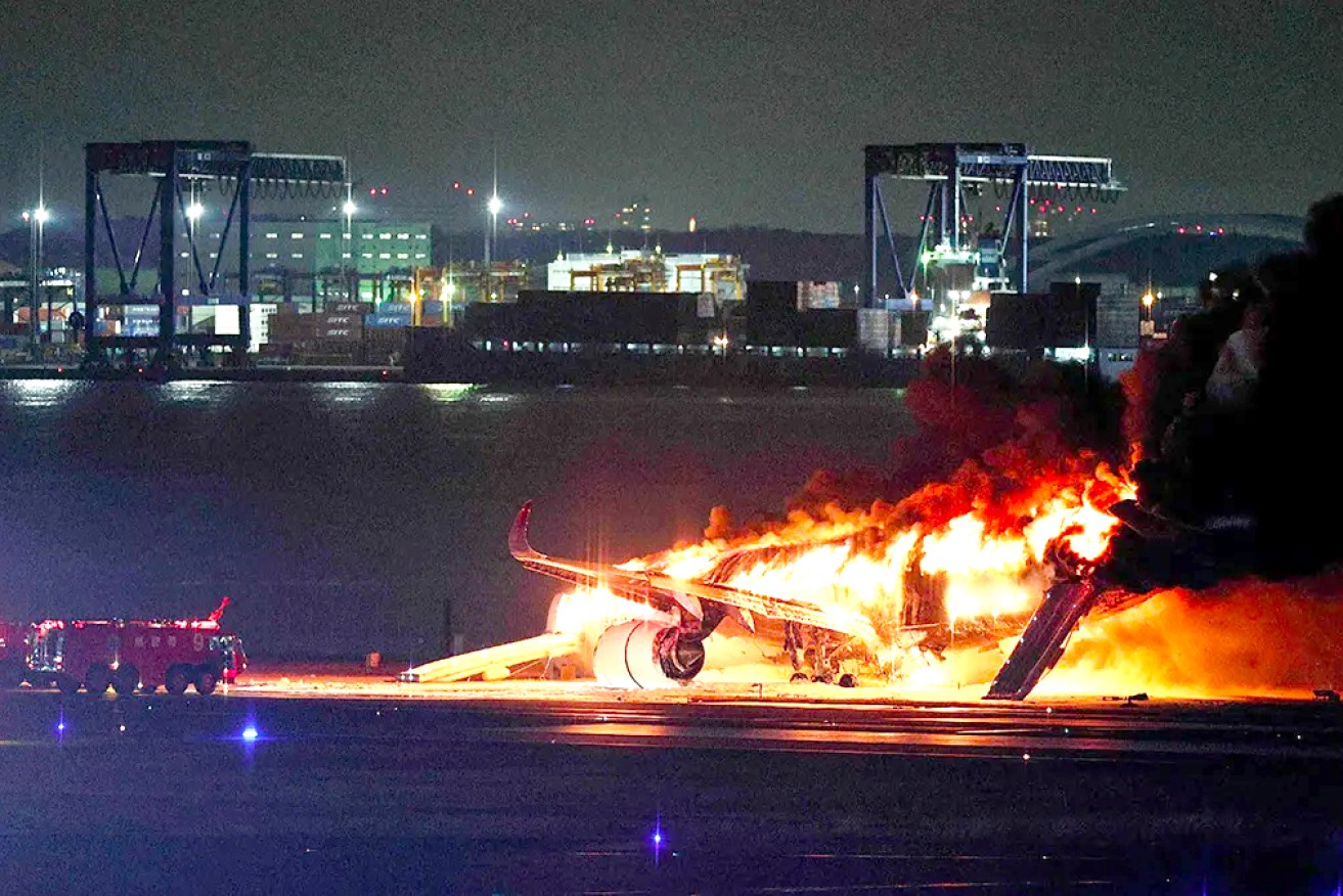 The plane burst into flames after all those on board were evacuated.