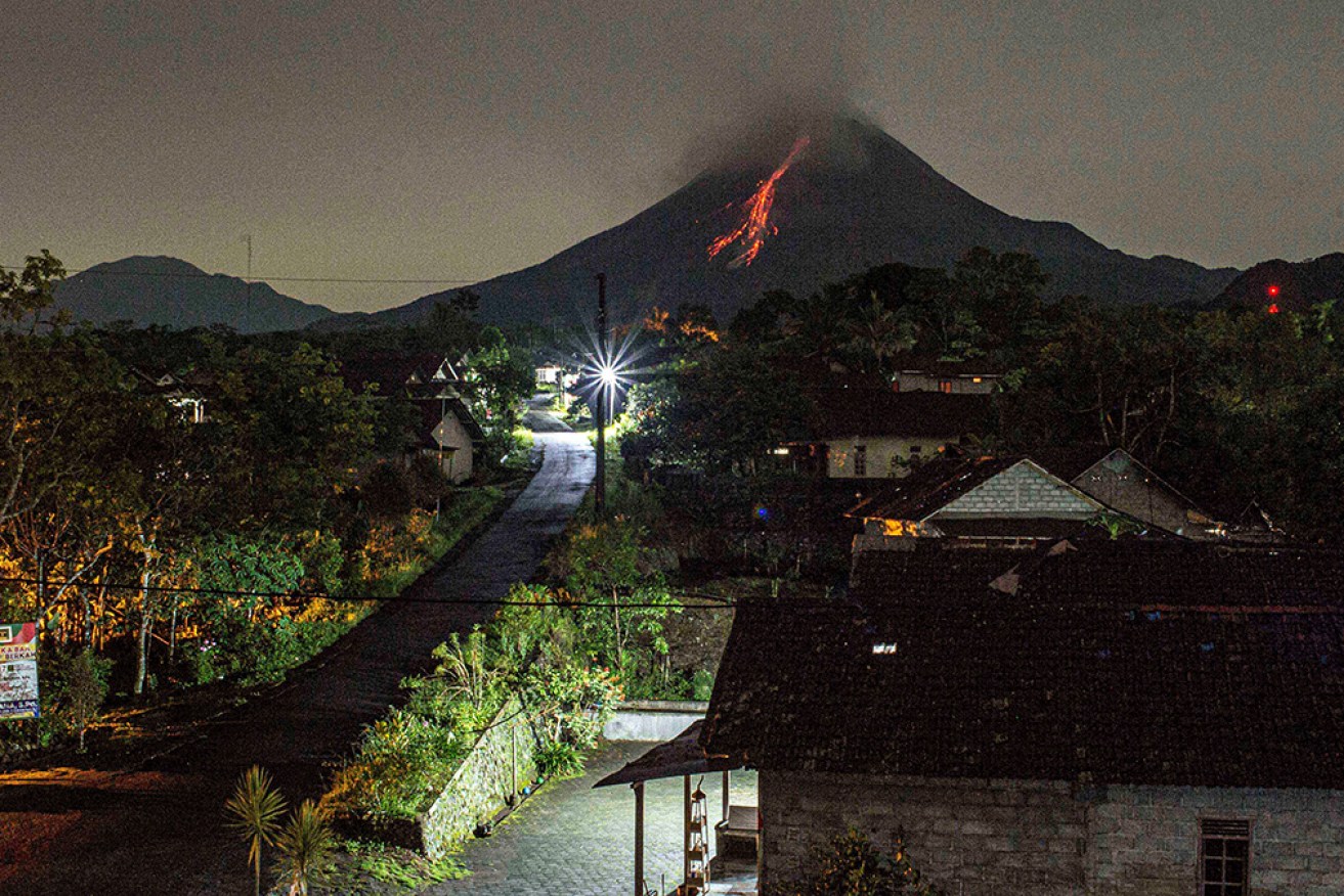 Mount Marapi is spewing volcanic material from its crater in West Sumatra, Indonesia.