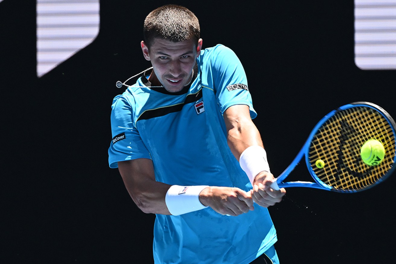 Alexei Popyrin has booked a second-round meeting with Novak Djokovic at the Australian Open.