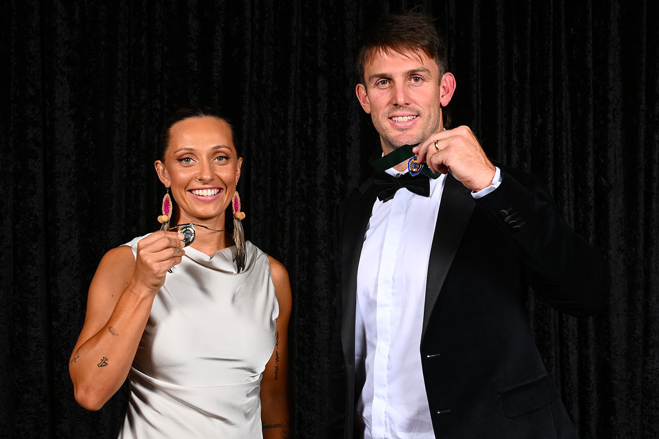 Belinda Clark Award winner Ashleigh Gardner poses with Allan Border Medal winner Mitchell Marsh in Melbourne on Wednesday night.