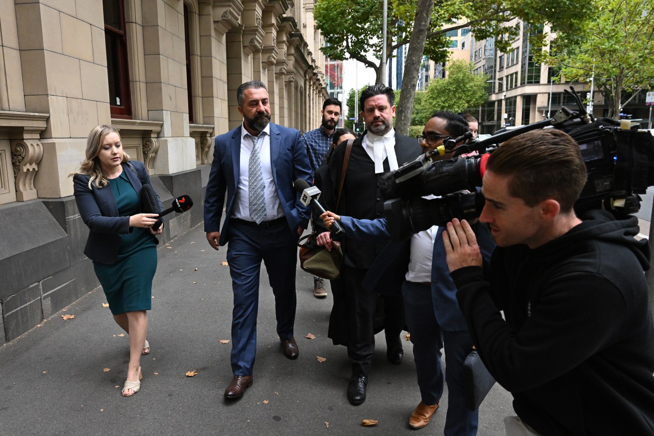 Laith Hanna (2nd left) has avoided jail time but his company has been fined $1.3 million.