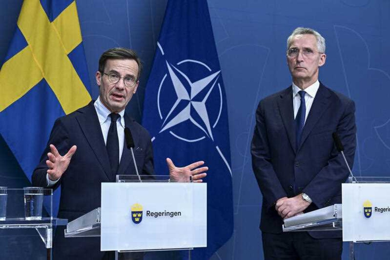 Sweden's Prime Minister Ulf Kristersson (left) and NATO Secretary General Jens Stoltenberg.