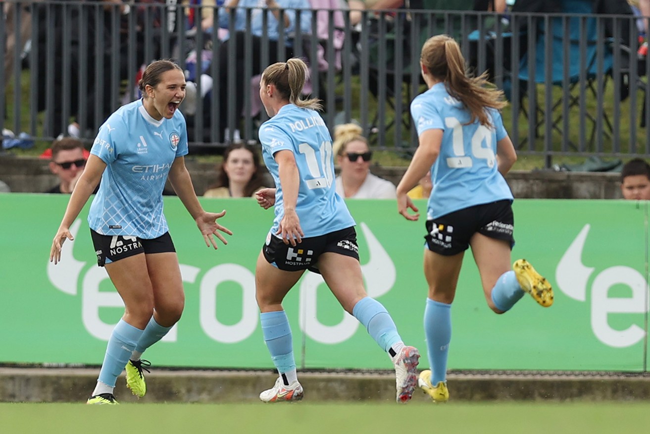Teammates flock to Daniela Galic after her early goal for Melbourne City against Newcastle Jets on Sunday afternoon.  