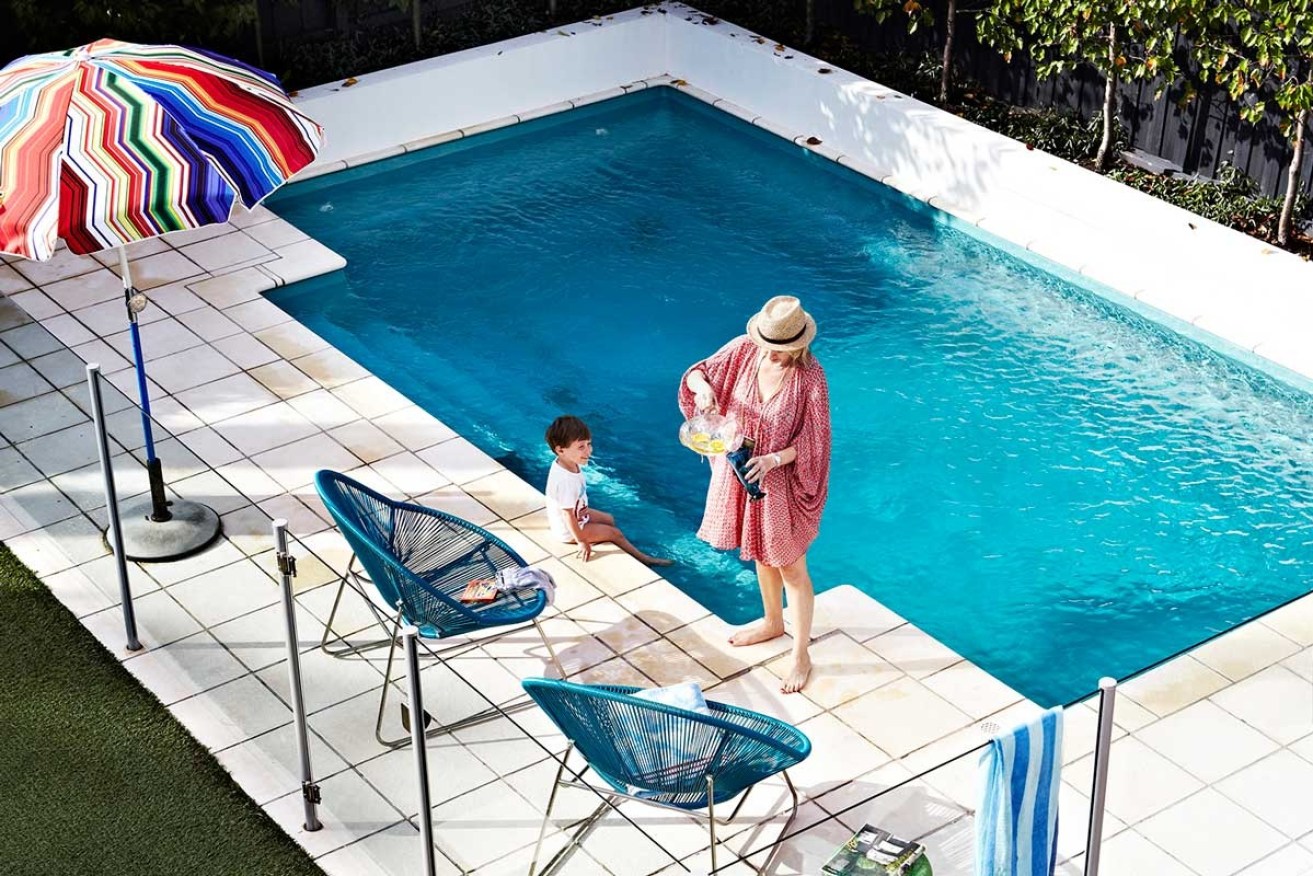 Poolside at Julia Green’s Melbourne family home.