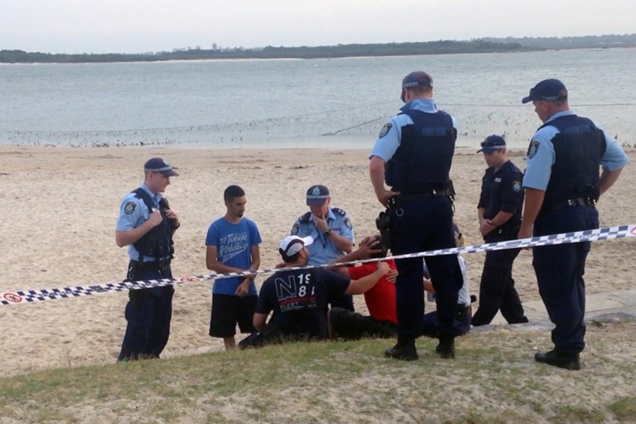 A father has broken down in distress on a south Sydney beach after his five-year-old boy vanished.