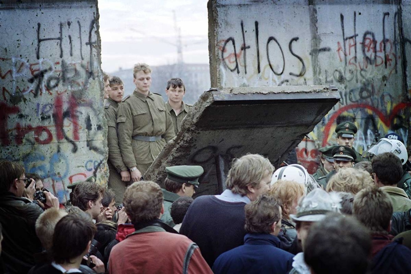 The Berlin Wall comes down in 1989.