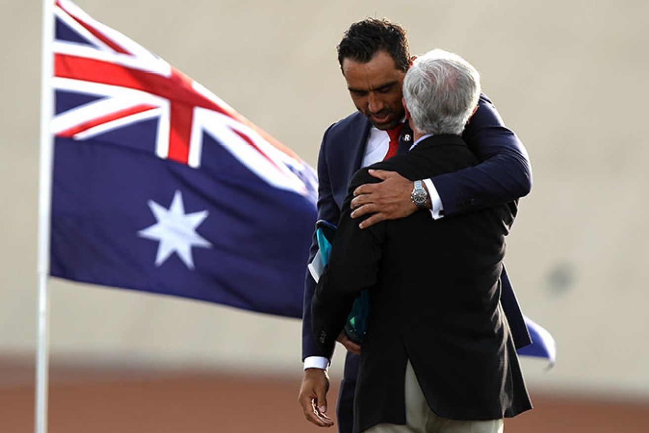 Australian of the Year, Adam Goodes, embraces the Senior Australian of the Year, Fred Chaney.