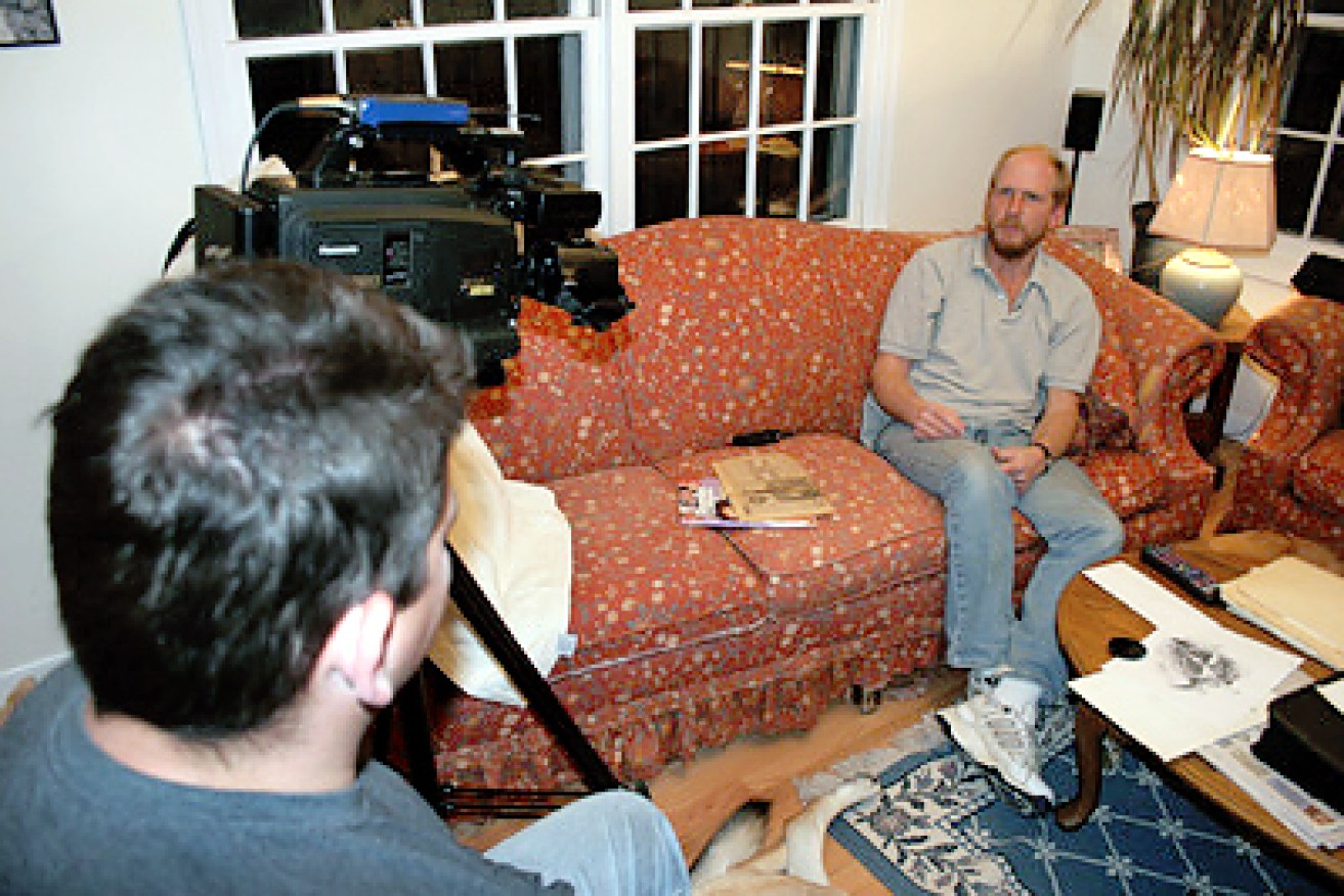 Jaws victim ... Jeff Voorhees (right) is interviewed.