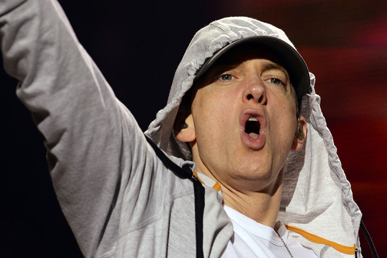 "You should be afraid of this dang candidate," Eminem writes.
