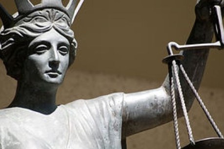 Court told how gender academic killed his wife