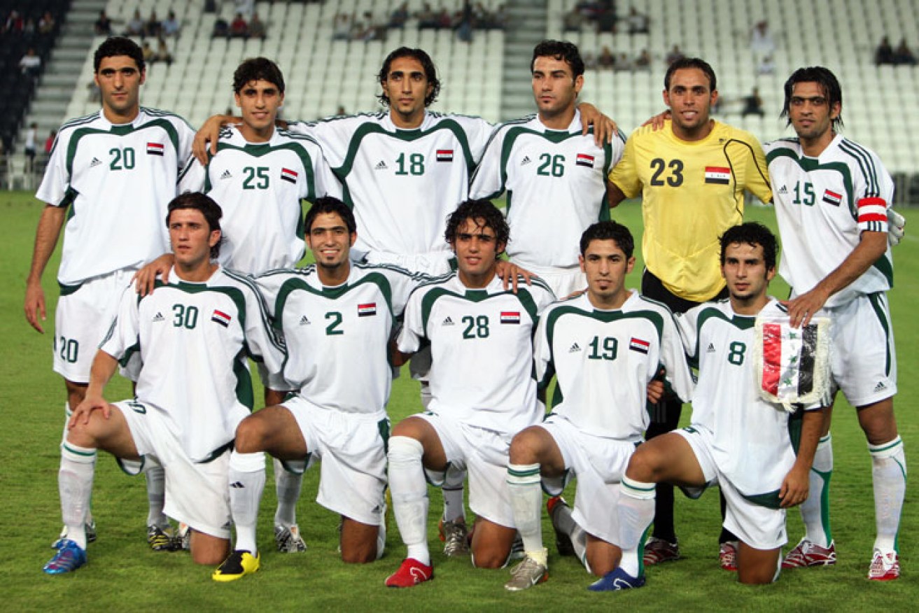 With the Iraqi Olympic team (front row, second from right). Picture: Getty