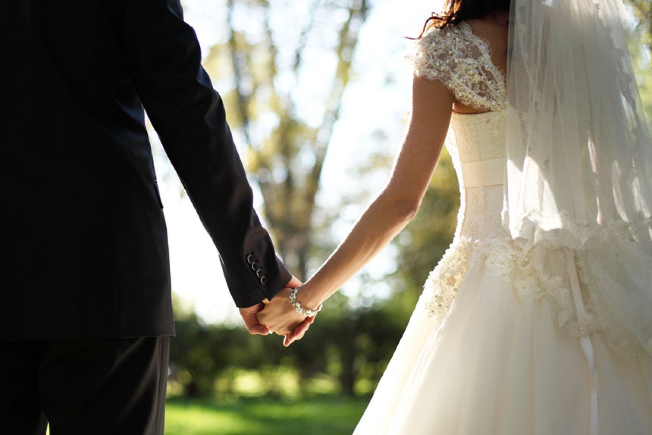 A Melbourne woman stole money from her ex and spent some of it on bridal wear.