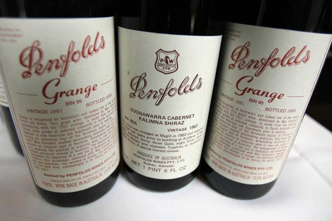 Dozens of bottles of Grange Hermitage and Penfolds wines worth at least $14,000 have been stolen from a Melbourne home.