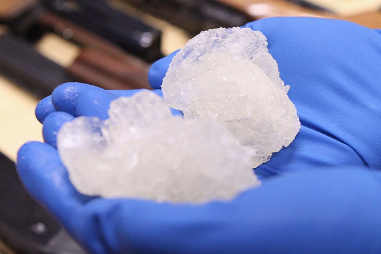 Three men have been charged after 90kgs of meth (pictured) was found in futon shipments.