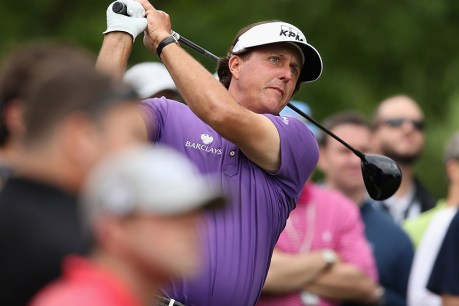 Golfer Phil Mickelson, 50, on the verge of making history as oldest PGA champ