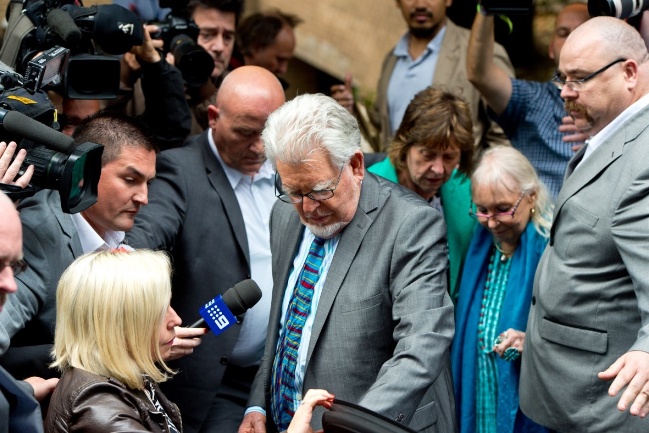 Disgraced entertainer and serial groper Rolf Harris leaves an earlier trial that sent him to prison.