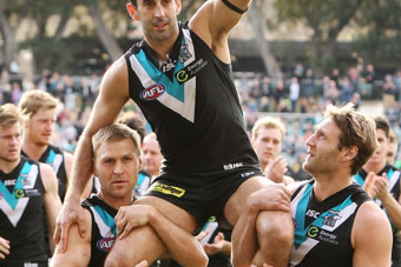 Domenic Cassisi is carried off after his retirement game for Port Adelaide. Photo: Getty
