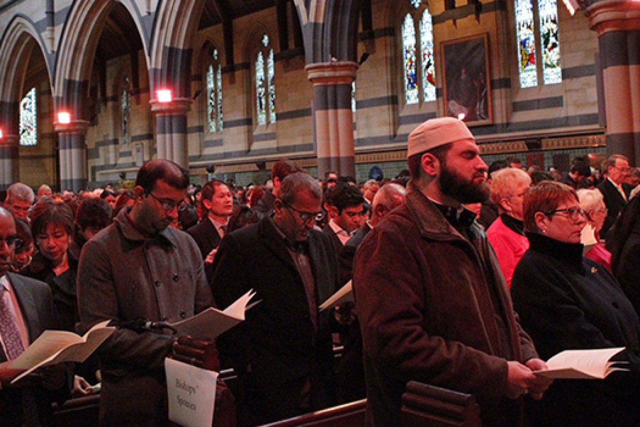 Mourners at the multi-faith ceremony in Melbourne. Photo: AAP
