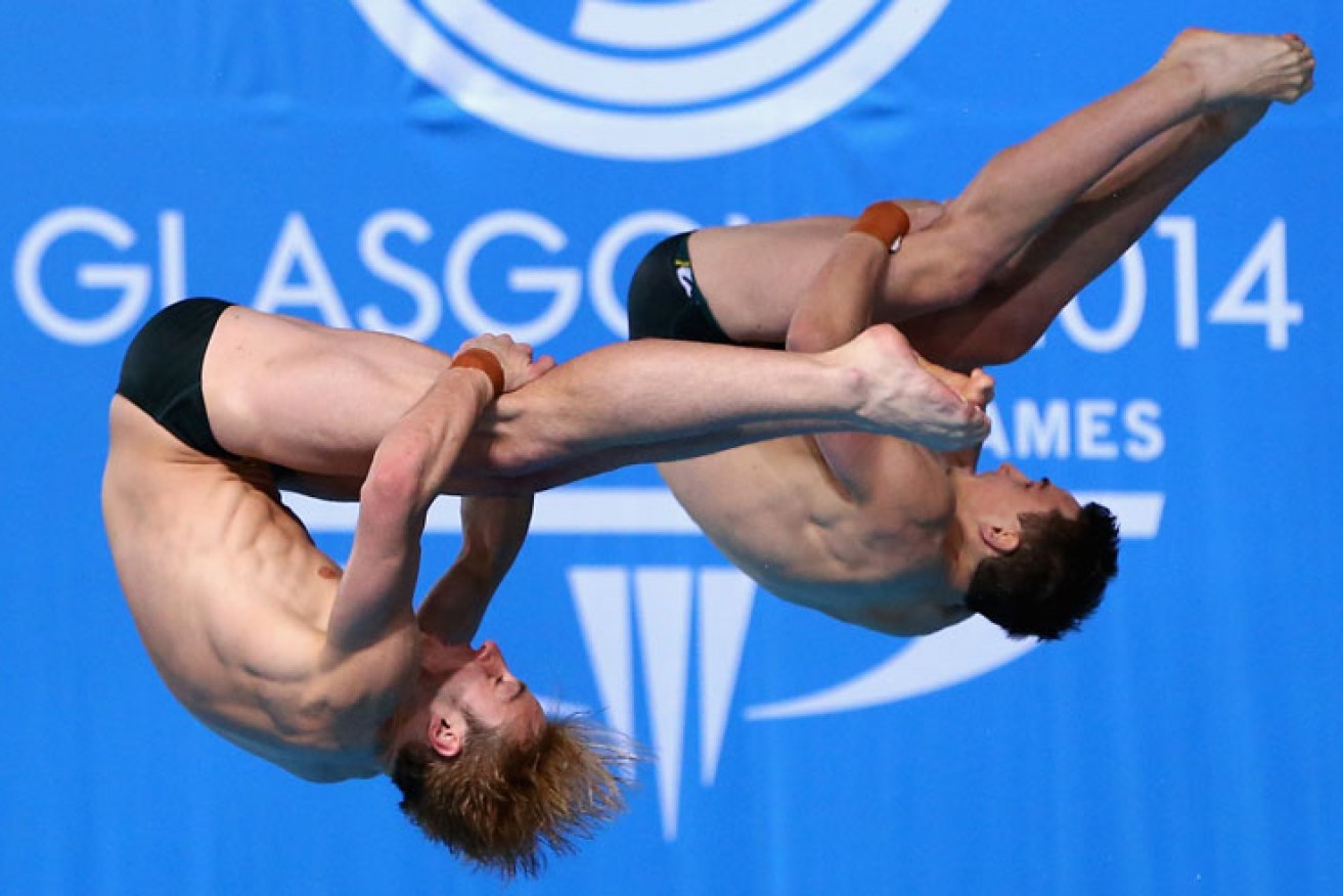Matthew Mitcham (L) and Domonic Bedggood in the final of the synchronised 10m platform diving. Photo: Getty