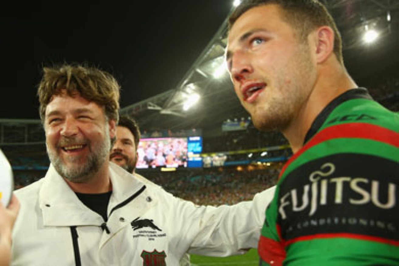 That's my boy: Russell Crowe and Sam Burgess after the game. Photo: Getty