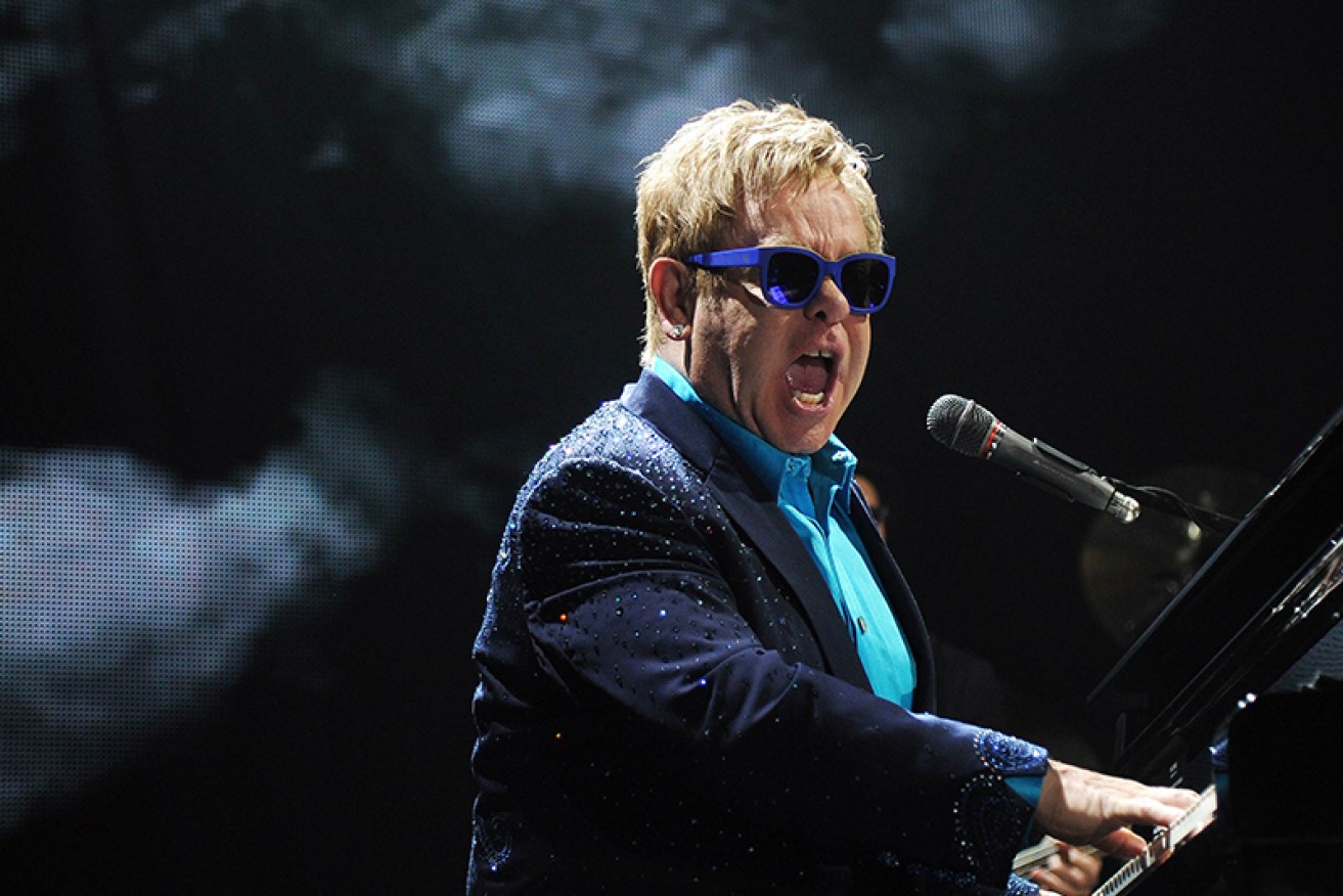 Elton John says Michael donated to charity without fanfare.