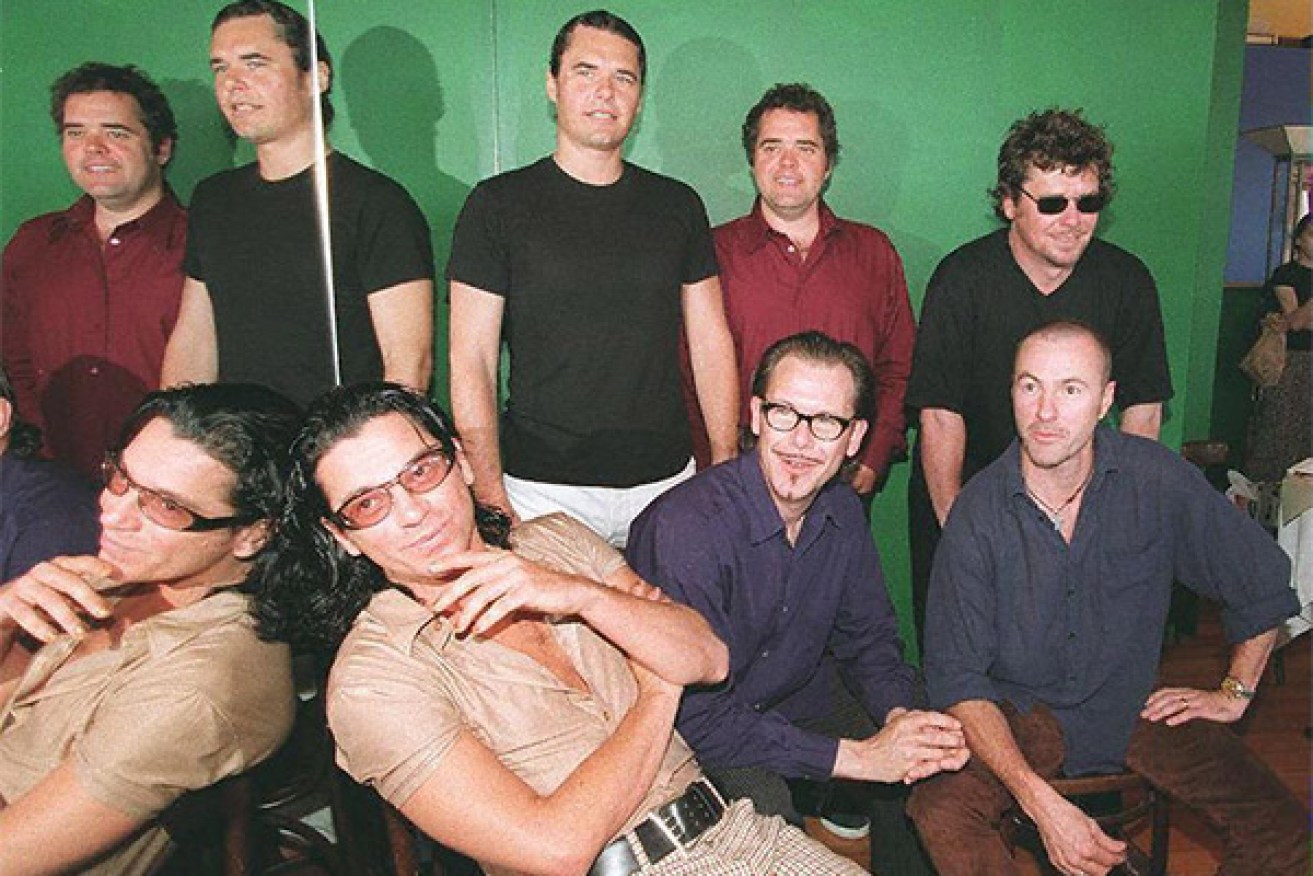 Garry Beers, (bottom right), with his INXS bandmates. Photo: AAP