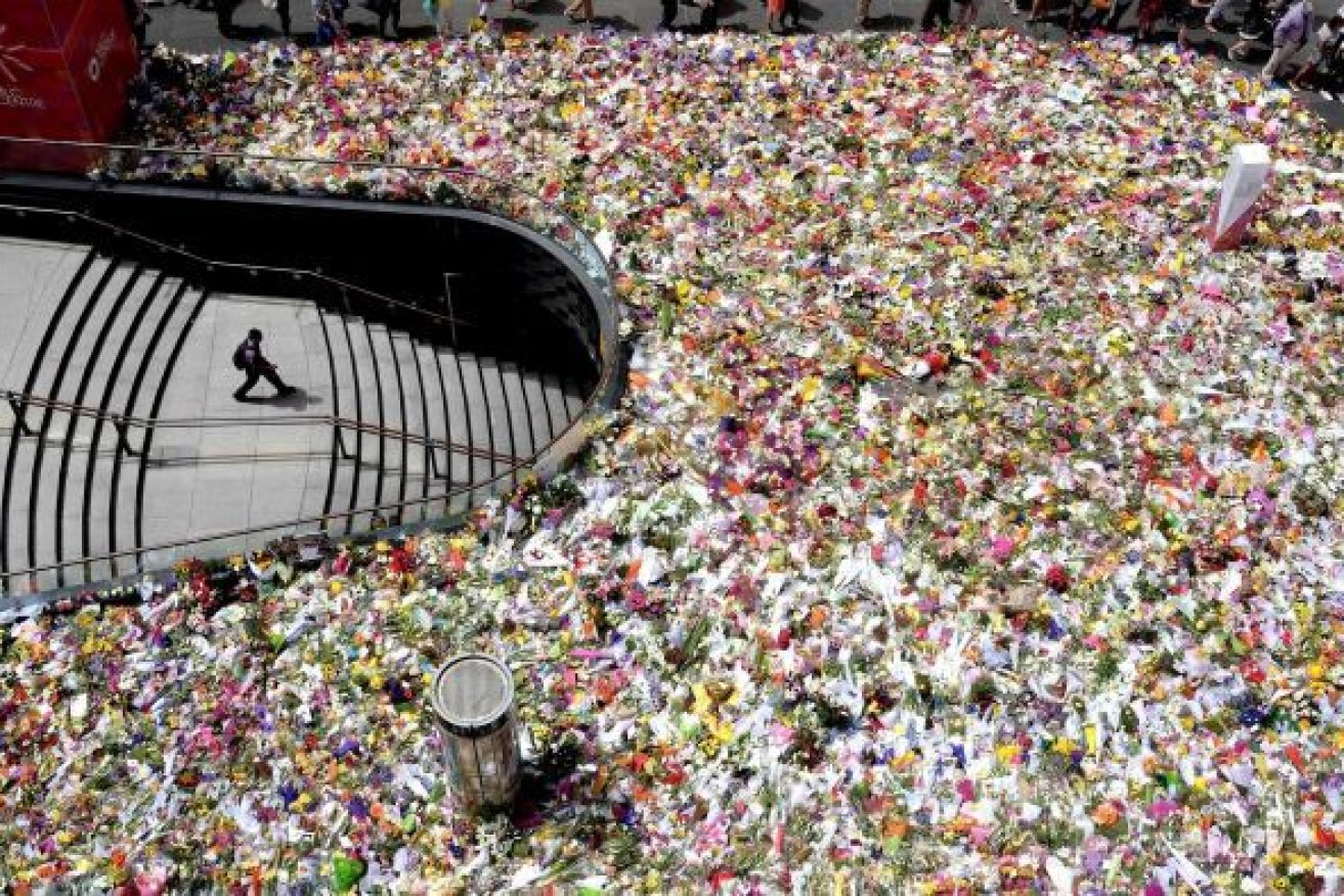 Floral tributes for victims of the siege filled Martin Place after the attack.