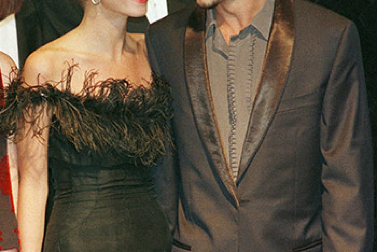 Super cool: With then partner Kate Moss at the premiere of Fear and Loathing in Las Vegas at Cannes in 1998. Photo: AAP