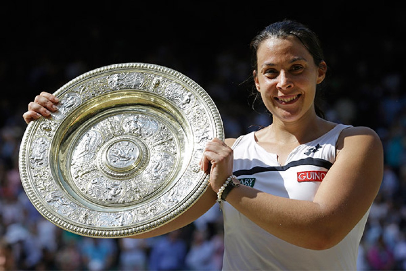 Wimbledon 2013 champion Marion Bartoli received ridiculously sexist commentary after her win. Photo: AAP