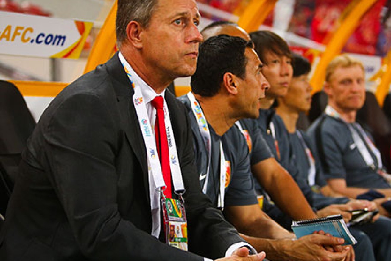 China's coach Alain Perrin during a group match at Suncorp Stadium. Photo: Getty