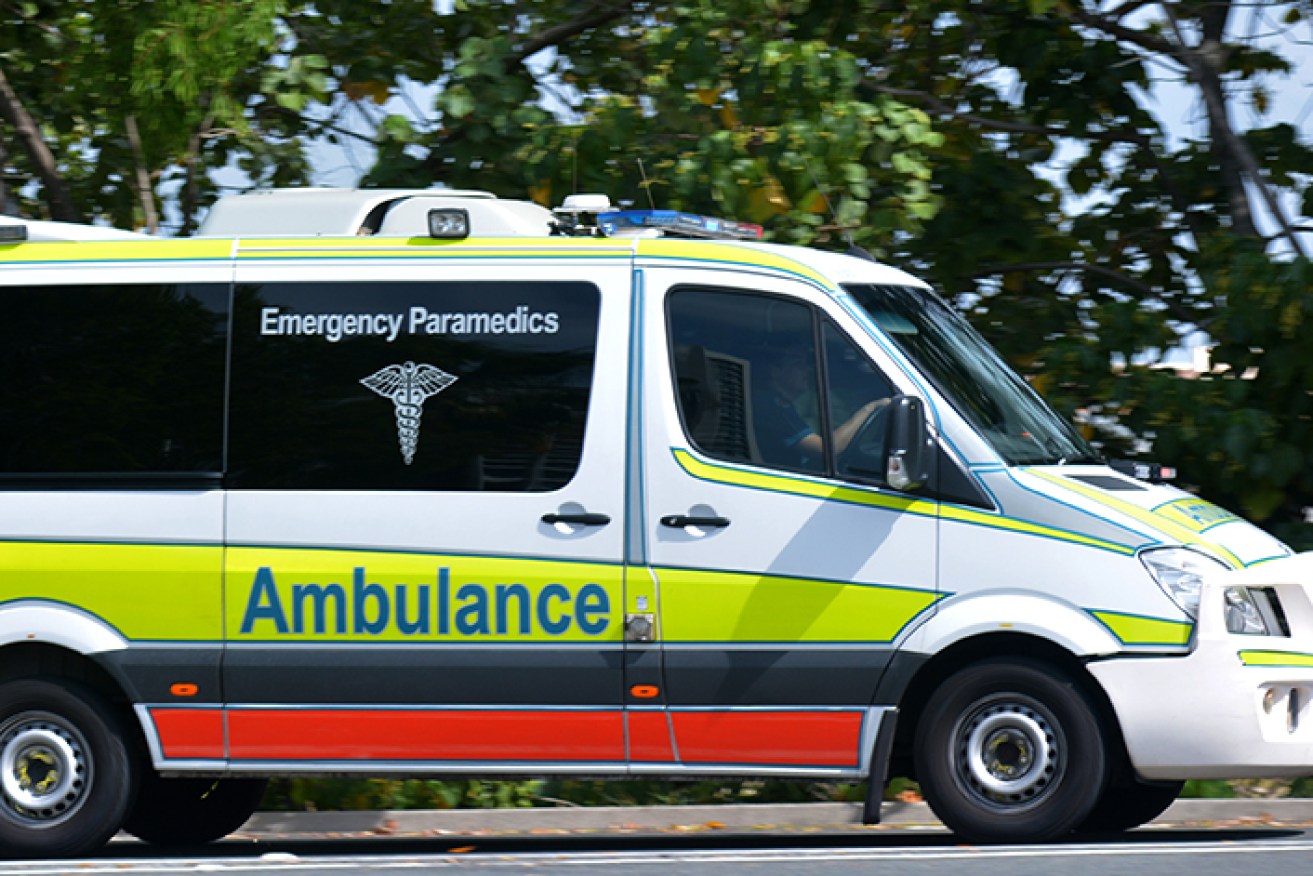 A child found unconscious on a bus in central Queensland has been moved to a Brisbane hospital.