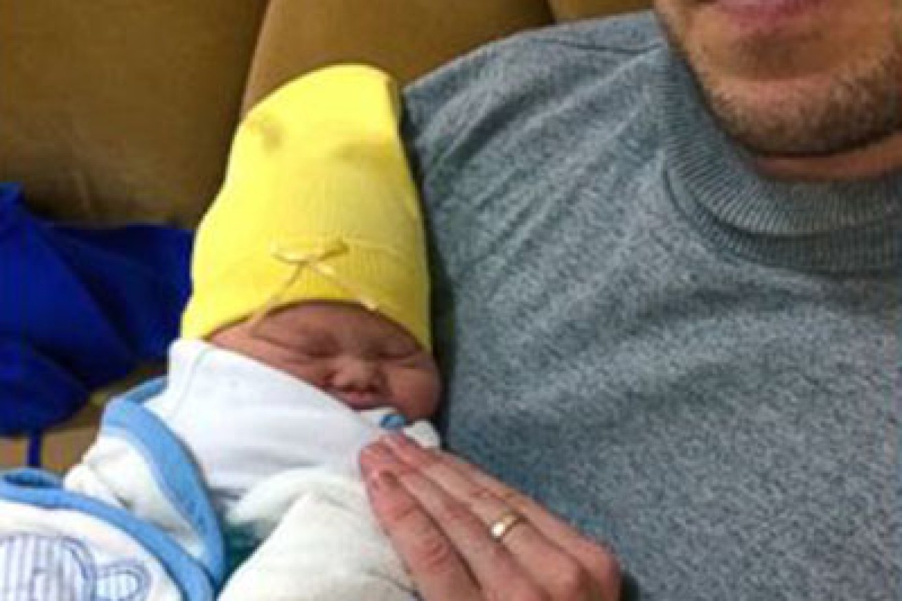 Sam Forrest with baby Leo. Photo: ABC