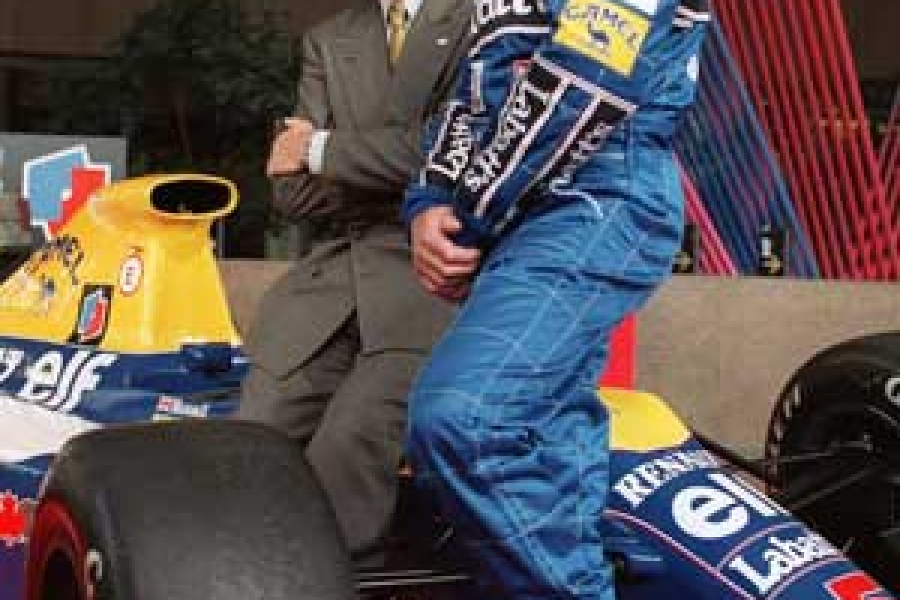 Nigel Mansell and his championship-winning Williams. Photo: AAP