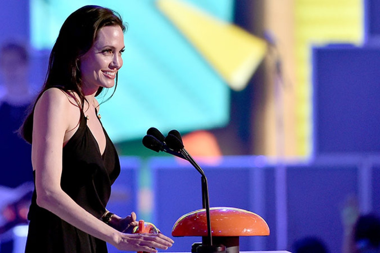 Jolie accepts her award for 'Best Villain'. Photo: Getty
