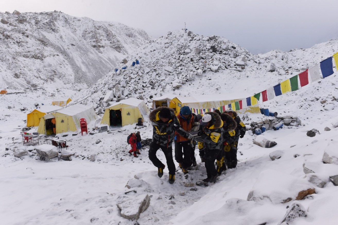 The thin, frigid air of Everest base camp has seen COVID rage among climbers, a professional guide says.